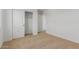 Room featuring sliding closet doors and neutral carpet at 11627 W Green Dr, Youngtown, AZ 85363