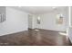 Spacious living area featuring stylish tile flooring and abundant natural light from multiple windows at 11627 W Green Dr, Youngtown, AZ 85363
