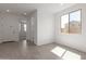 Welcoming entryway featuring tile floors, white walls and doors and natural light at 11631 W Green Dr, Youngtown, AZ 85363