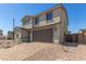 Beautiful two-story home with a two car garage, neutral color palette and brick driveway at 11631 W Green Dr, Youngtown, AZ 85363