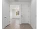 Bright entryway reveals a spacious layout with modern flooring, creating a welcoming ambiance at 11635 W Beck Ave, Youngtown, AZ 85363