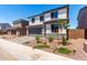 Charming two-story home with a well-manicured lawn and tasteful landscaping at 11635 W Beck Ave, Youngtown, AZ 85363