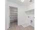 Laundry room with large pantry, tile flooring, and plenty of space for appliances at 11635 W Beck Ave, Youngtown, AZ 85363