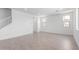 Large living room showcases stairs and an abundance of bright natural light at 11635 W Beck Ave, Youngtown, AZ 85363