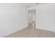 Bright living room with light tile flooring and fresh white walls at 11635 W Beck Ave, Youngtown, AZ 85363
