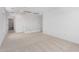 Large loft area features neutral carpeting and views of the staircase at 11635 W Beck Ave, Youngtown, AZ 85363