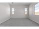 Large bedroom with carpet and multiple windows providing lots of natural light at 12022 W Marguerite Ave, Avondale, AZ 85323