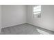 Light bedroom with a window offering natural light at 12022 W Marguerite Ave, Avondale, AZ 85323