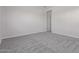 Spacious bedroom with neutral carpet ready for personalization at 12022 W Marguerite Ave, Avondale, AZ 85323