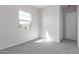 Bright bedroom with a window offering natural light at 12022 W Marguerite Ave, Avondale, AZ 85323
