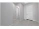 Bright entryway with tiled floor and white doors at 12022 W Marguerite Ave, Avondale, AZ 85323