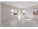 Bright, spacious living area with tile floors and natural light at 12022 W Marguerite Ave, Avondale, AZ 85323