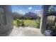 A spacious backyard offers green grass, block fence, room for outdoor activities, and comfortable outdoor living at 13001 W Aster Dr, El Mirage, AZ 85335