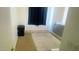 Bedroom with neutral carpet, a large window, and a calming atmosphere at 13001 W Aster Dr, El Mirage, AZ 85335