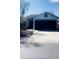Charming single-story home featuring a two-car garage, desert landscaping, and a welcoming entrance at 13001 W Aster Dr, El Mirage, AZ 85335