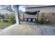 Enjoy outdoor relaxation on this covered patio with a comfortable swing, perfect for enjoying the surrounding landscape at 13001 W Aster Dr, El Mirage, AZ 85335