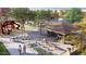 Scenic community park with picnic tables, benches, and walking paths surrounded by trees and flowers at 13525 N 158Th Ave, Surprise, AZ 85379