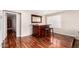Entertaining space featuring a stylish bar area and hardwood floors at 1434 W Meseto Ave, Mesa, AZ 85202