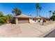 Charming single-story home with a two-car garage, desert landscaping, and a welcoming facade at 1434 W Meseto Ave, Mesa, AZ 85202