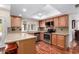 Bright kitchen featuring granite countertops, stainless appliances, and recessed lighting at 1434 W Meseto Ave, Mesa, AZ 85202
