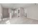 Upstairs hallway featuring neutral carpet and multiple doorways leading to various rooms at 15584 S 180Th Ln, Goodyear, AZ 85338