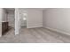 Carpeted bedroom space with ensuite bathroom featuring shower and vanity at 15586 S 181St Dr, Goodyear, AZ 85338