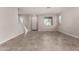 Bright, open living space with neutral walls and tile floors at 15586 S 181St Dr, Goodyear, AZ 85338