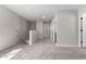 Bright loft area with neutral carpet, staircase and multiple rooms with neutral paint at 15586 S 181St Dr, Goodyear, AZ 85338