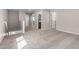 Upstairs loft area with neutral carpeting and multiple doorways, ideal for flexible living at 15586 S 181St Dr, Goodyear, AZ 85338