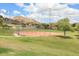 Well-maintained baseball field in a picturesque park setting at 1679 E Saltsage Dr, Phoenix, AZ 85048