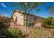 Backyard with desert landscaping, including trees, bushes and aloe at 16802 N 20Th St, Phoenix, AZ 85022