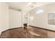 Spacious bedroom featuring hardwood floors and abundant natural light through a large window at 16802 N 20Th St, Phoenix, AZ 85022