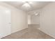 Clean bedroom with tile flooring and a ceiling fan at 16802 N 20Th St, Phoenix, AZ 85022