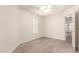 Cozy bedroom with neutral paint, tile flooring, and a ceiling fan at 16802 N 20Th St, Phoenix, AZ 85022