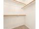 Walk-in closet with ample shelving and storage space for organization and convenience at 16802 N 20Th St, Phoenix, AZ 85022