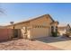 Single-Gathering home with a two-car garage and desert landscaping at 16802 N 20Th St, Phoenix, AZ 85022