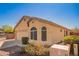 Single-Gathering home with a two-car garage and desert landscaping at 16802 N 20Th St, Phoenix, AZ 85022