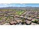 Lush desert community near a golf course with single-Gathering homes, desert landscaping, and tile roofs at 20453 N 264Th Ave, Buckeye, AZ 85396