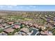 Desert community near a golf course, showing single-Gathering homes, desert landscaping, and tile roofs at 20453 N 264Th Ave, Buckeye, AZ 85396