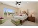 Bright and airy bedroom with a large window and plush carpeting at 20453 N 264Th Ave, Buckeye, AZ 85396