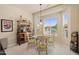 Cozy breakfast nook illuminated by natural light from surrounding windows at 20453 N 264Th Ave, Buckeye, AZ 85396
