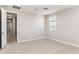 Cozy bedroom bathed in natural light, featuring neutral walls and plush carpet, perfect for relaxation at 21232 N 58Th St, Phoenix, AZ 85054