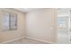 Bedroom featuring neutral walls, carpet floors, and a window with blinds at 21248 N 58Th St, Phoenix, AZ 85054