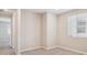 Bedroom with neutral paint, carpeted floors, and a window with blinds at 21248 N 58Th St, Phoenix, AZ 85054