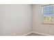 Bedroom with neutral paint, carpeted floors, and a window with blinds at 21248 N 58Th St, Phoenix, AZ 85054