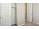 Open closet with shelving provides ample storage in this well-lit bedroom with modern doors at 21248 N 58Th St, Phoenix, AZ 85054