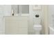 Clean, white bathroom featuring a modern vanity, toilet, and shower with tiled walls at 24863 N 167Th Dr, Surprise, AZ 85387