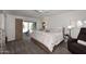 Comfortable bedroom with carpet, ceiling fan and sliding glass door leading to the backyard at 25 E San Miguel E Ave, Phoenix, AZ 85012