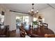 Charming dining room with sliding glass doors leading to an outdoor patio, perfect for alfresco dining and entertaining at 25 E San Miguel E Ave, Phoenix, AZ 85012