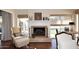 Elegant fireplace creates a warm ambiance in the living area with views to the patio and garden at 25 E San Miguel E Ave, Phoenix, AZ 85012